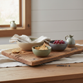 Rustic reclaimed wood serving board with stoneware pottery